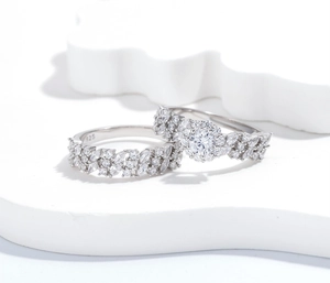Macro view of S925 sterling silver halo ring and marquise eternity band with 925 hallmark