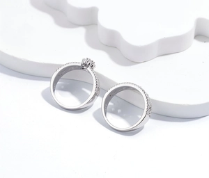 Macro shot showing S925 hallmark on the inner band of silver diamond crown rings