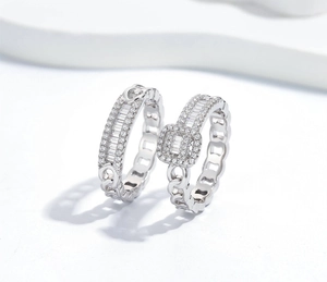 Macro detail of S925 silver chain link ring set with brilliant pave-set zircon stones