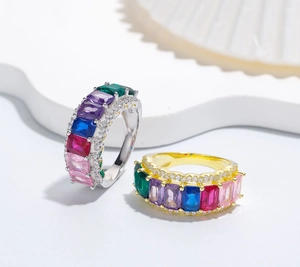 Close-up of S925 sterling silver rings with colorful rectangle gemstones and pavé accents