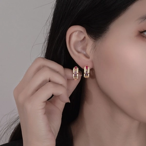 Luxury 925 sterling silver gold plated hoop earrings with colorful crystals on model