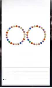 Macro detail of S925 silver hoop earrings with 5A rainbow zircon and gold plating