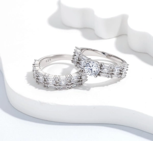 Macro shot of 925 silver ring set with zircon on white wavy display stand