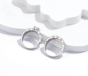 Detailed macro view of S925 sterling silver rings with cubic zirconia and S925 hallmark