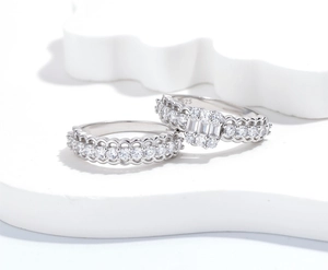 Macro shot of S925 silver stacked rings set with zircon micro-pave and geometric halo