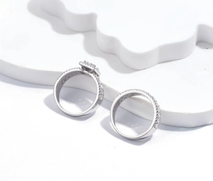 Macro detail of S925 sterling silver ring set featuring pavé cubic zirconia gemstones