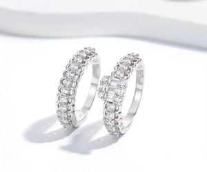 Macro shot of S925 sterling silver stacked rings with cubic zirconia pave settings