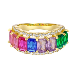 Golden band ring featuring multi-color rectangular gemstones and micro-pave diamonds
