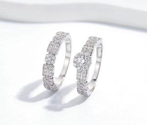 Macro detail of S925 sterling silver stamp and pave setting on stacked ring set
