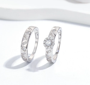 Macro detail of S925 sterling silver stamp on minimalist wedding ring set with zircons