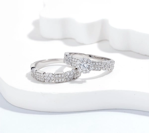 Close-up of S925 sterling silver stacked ring set with micro-pave zircon on wavy pedestal