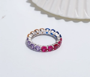 Detailed macro view of 925 sterling silver ring with colorful rainbow cubic zirconia