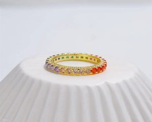 Macro shot of 925 silver rainbow eternity ring with multi-color 5A cubic zirconia stones