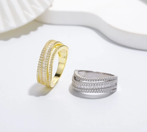Detailed macro of multi-layer S925 sterling silver rings with micro-paved cubic zirconia