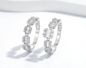 Detailed view of S925 sterling silver geometric rings with baguette and round cut stones
