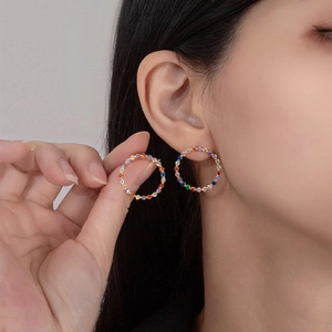 Fashion 925 silver 18k gold plated hoop earrings with colorful rainbow zircons on model