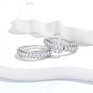 Elegant S925 sterling silver ring set with rectangle cubic zirconia on a white stand