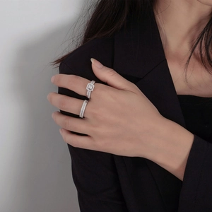 Sparkling S925 silver ring set with square halo zircon worn by model in black suit