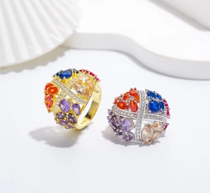 Close-up of 925 silver stamp on multi-color gemstone rings with gold plating