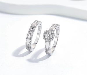 Detaillierte Makroaufnahme der S925 Silber Paarringe mit Zirkonia-Einlage für Damen