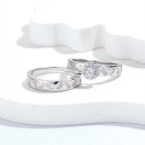 S925 sterling silver ring set with round halo centerpiece and geometric baguette band