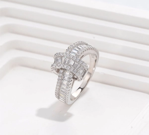 Macro detail of 925 silver ring featuring baguette-cut and round micro-set stones