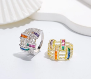 Detail of 925 silver wide woven rings with rainbow gemstones and micro-pave crystals