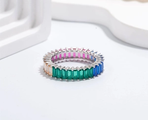 Macro shot of S925 silver ring featuring multi-color baguette-cut cubic zirconia stones