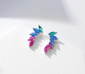 Detail of S925 sterling silver leaf stud earrings with marquise-cut colored crystals