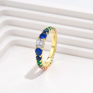 Rainbow eternity ring in gold finish with colorful zircons and central white stone