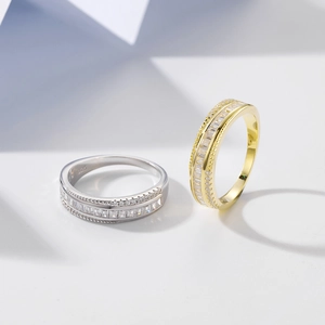 Anelli eternity in argento 925 con zirconi rettangolari in finiture oro e argento