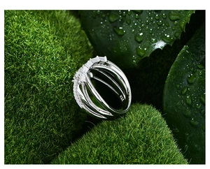 Detail of S925 sterling silver stamp on multi-layer pavé cubic zirconia ring band