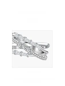 Macro detail of 925 silver layered ring with baguette and round cubic zirconia stones