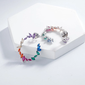 Silver olive branch wreath earrings set with colorful marquise-cut cubic zirconia gems