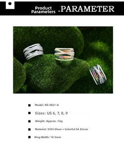 Detail view of S925 silver wide crossover rings with 5A cubic zirconia and moss background