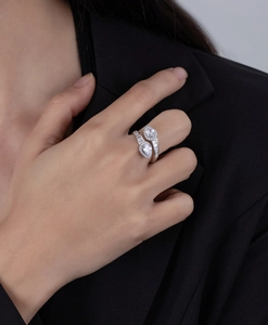 Close-up of adjustable s925 silver ring with dual pear-cut high carbon diamonds