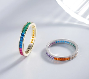 Macro shot of S925 sterling silver rainbow rings with channel-set colorful gemstones