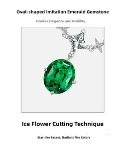Detail of egg-shaped emerald gemstone pendant with ice flower cut and star silver accent