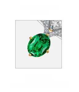Macro shot of oval simulated emerald ring featuring ice flower cut and halo setting