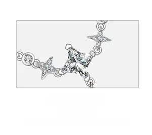 Macro shot of 925 silver necklace pendant with emerald-cut zirconia and star details