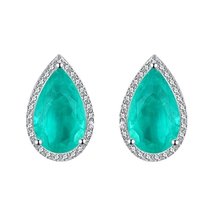 Sterling silver pear-shaped emerald drop earrings with white zircon halo on white background