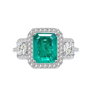 925 silver emerald cut green gemstone ring with side stones and halo diamonds