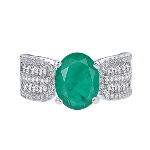 Bague de luxe avec émeraude ovale et large anneau pavé de diamants en argent massif