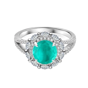 Elegant 925 sterling silver ring with 8mm round paraiba stone and marquise halo