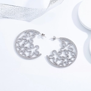 Luxurious S925 sterling silver hollow flower hoop earrings with micro-set zircons