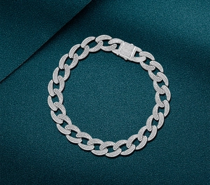 Detailed close-up of hip hop cuban link bracelet with micro-pave white zircon settings