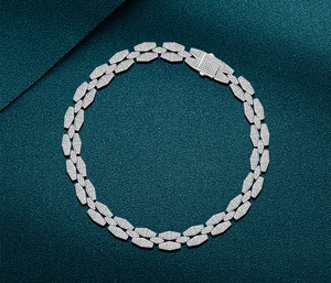 Macro shot of silver micro-pave cubic zirconia hexagon link bracelet with rectangle clasp