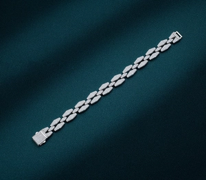 Macro view of iced out geometric silver cuban bracelet with full pave diamond setting