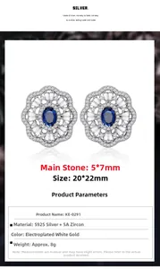 Macro view of flower-shaped 925 silver earrings with 5x7mm oval blue sapphire zircons