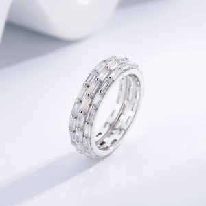 Three-row baguette-cut zircon eternity ring in sterling silver with an irregular arrangement